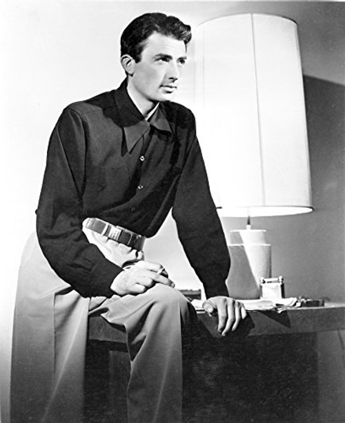 Posterazzi Gregory Peck Sitting on a Side Table with a lamp Photo Print (8 x 10)