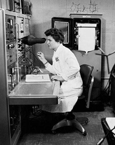 Side profile of a female technician working in a laboratory Poster Print (18 x 24)
