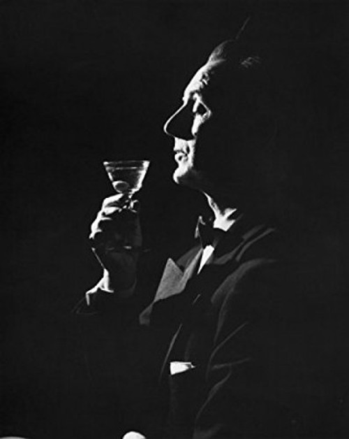 Posterazzi SAL25512598A Side profile of a mature man holding a martini Poster Print 18 x 24 Posterazzi SAL25512598A Side profile of a mature man holding a martini Poster Print 18 x 24