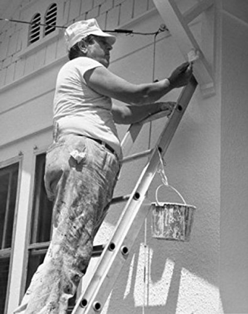 Posterazzi Side profile of a mature man standing on a ladder and painting a building Poster Print (18 x 24) Posterazzi Side profile of a mature man standing on a ladder and painting a building Poster Print (18 x 24)