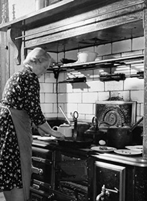Posterazzi Side Profile of a Mature Woman Cooking Food in The Kitchen Poster Print, (18 x 24) Posterazzi Side Profile of a Mature Woman Cooking Food in The Kitchen Poster Print, (18 x 24)