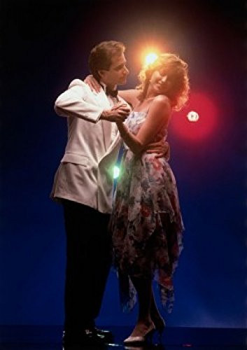 Side profile of a young couple dancing in a nightclub Poster Print (18 x 24)