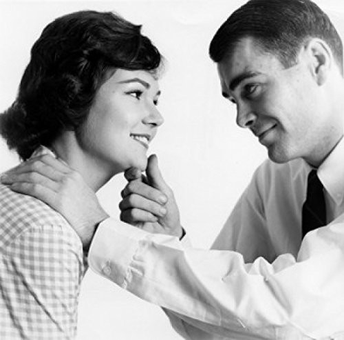 Side profile of a young couple looking at each other Poster Print (18 x 24)