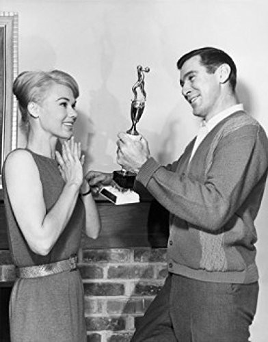 Posterazzi Side Profile Man Showing a Trophy to a Young Woman Poster Print (18 x 24)