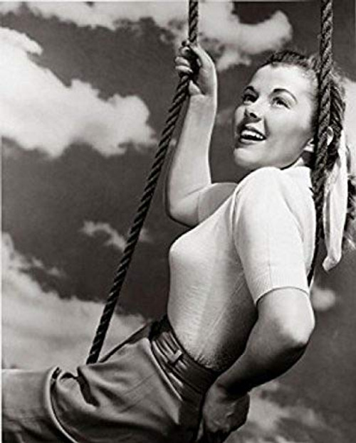 Posterazzi Side Profile of a Young Woman Sitting on a Swing Poster Print, (18 x 24) Posterazzi Side Profile of a Young Woman Sitting on a Swing Poster Print, (18 x 24)