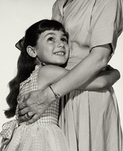 Side profile of girl hugging her mother Poster Print (18 x 24)