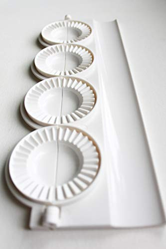 pierogi, dumpling, uszka press/maker. Makes four pierogies at once