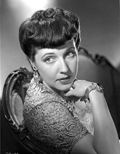 Mona Bari on Embroidered Top sitting and posed Photo Print (8 x 10)