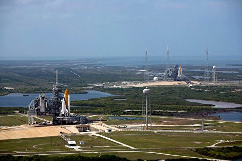 Space Shuttle Atlantis on Launch Pad 39A is accompanied by space shuttle Endeavour on Launch Pad 39B Poster Print by Stocktrek Images (17 x 11)