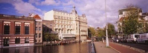 Posterazzi Buildings Along a Water Channel Amsterdam Netherlands Poster Print, (18 x 7), Varies Posterazzi Buildings Along a Water Channel Amsterdam Netherlands Poster Print, (18 x 7), Varies