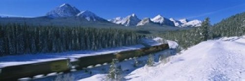Posterazzi Train moving on a railroad track with a mountain range in the background Banff National Park Alberta Canada Poster Print, (18 x 6)