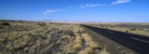 Posterazzi PPI119704S Desert road passing through the grasslands Namibia Poster Print, 18 x 7 Posterazzi PPI119704S Desert road passing through the grasslands Namibia Poster Print, 18 x 7