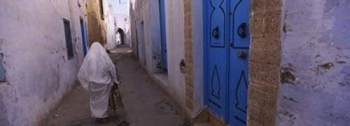 Posterazzi Rear View of a Woman Walking on The Street Medina Kairwan Tunisia Poster Print, (18 x 7), Varies