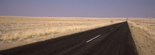 Posterazzi Road passing through a landscape Sperrgebiet Namib Desert Namibia Poster Print, (18 x 7)