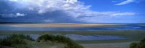 Posterazzi Clouds Over Budle Bay Northumberland England Poster Print, (18 x 6), Varies