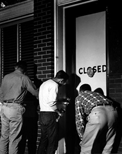 Three men breaking in to office Poster Print (18 x 24)
