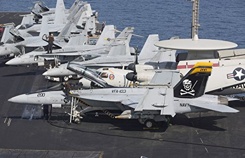 Posterazzi October 2 2012-A group of F/A-18F Super Hornets of VFA-103 Jolly Rogers during flight operations on the USS Dwight D Poster Print, (17 x 11