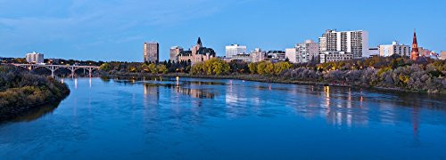 Posterazzi Skylines at waterfront South River Saskatoon Saskatchewan Canada Poster Print, (7 x 18)
