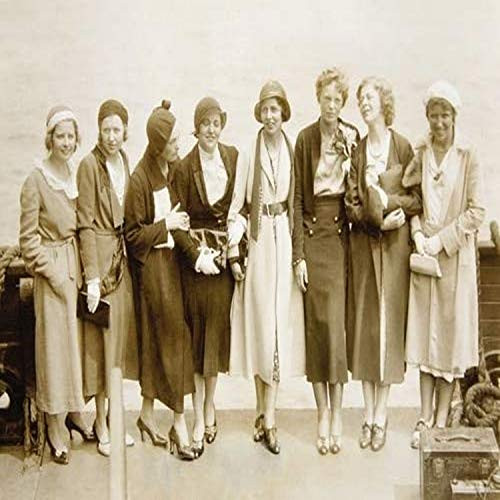 Early press photo of Amelia Earhart Earhart with seven other ladies pose for a photo Amelia Mary Earhart was an American aviation pioneer and author E