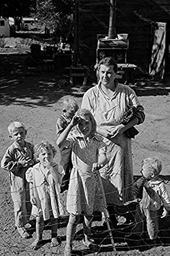 Buyenlarge 0-587-24121-7-P1218 Squatter Family in Shack Town Paper Poster, 12" x 18"