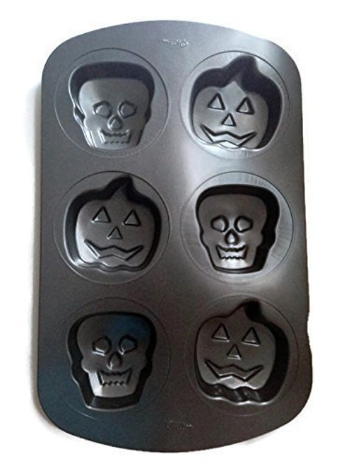Wilton Mini Cake Pan Skeletons & Jack-o'-lanterns Wilton Mini Cake Pan Skeletons & Jack-o'-lanterns