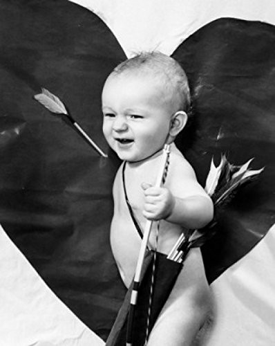 Posterazzi Side profile of a ba Poster Print by boy holding a bow and arrow, (18 x 24)