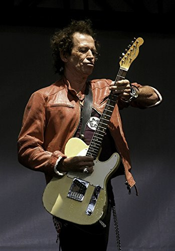 Keith Richards of The Rolling Stones performing on stage at their press conference to announce the Rolling Stones On Stage world tour Photo Print (8 x 10)