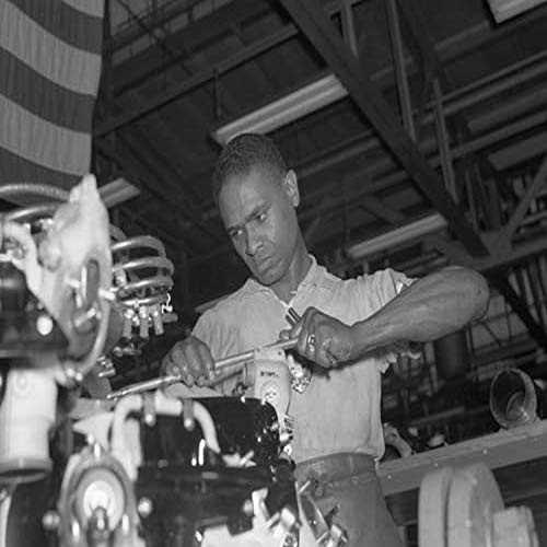 A skilled mechanic and determined war worker Zed W Robinson proves that skin pigment bears no relation to efficiency of work Hes one of many Negroes employed in a large Midwest aircraft plant in skill