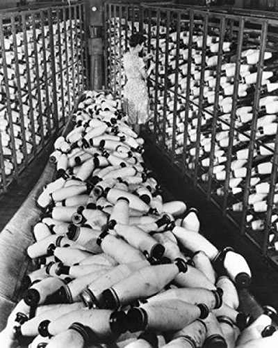 High angle view of a female worker in a textile factory Poster Print 18 x 24