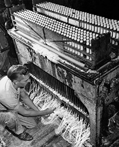 Posterazzi High angle view of a manual worker working in a candle factory Poster Print 18 x 24
