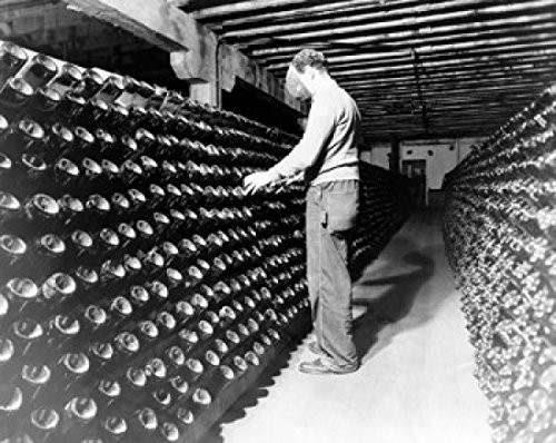 Posterazzi Manual worker working in a storage room of a food processing factory Poster Print 18 x 24