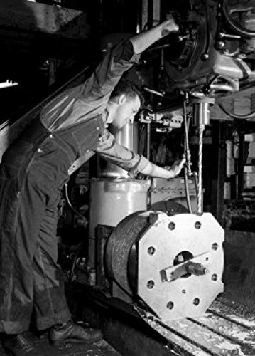 Posterazzi Man working in factory Poster Print 18 x 24