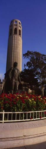 Statue of Christopher Columbus in front of a tower Coit Tower Telegraph Hill San Francisco California USA Poster Print 36 x 12