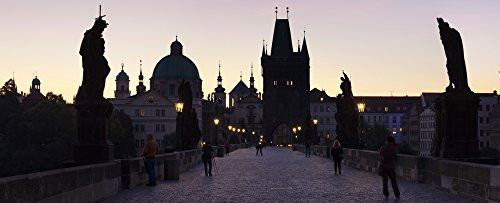 Posterazzi Silhouette of statues on Charles St Francis Church and Old Town Bridge Tower in the background Prague Czech Republic Poster Print 27 x 9