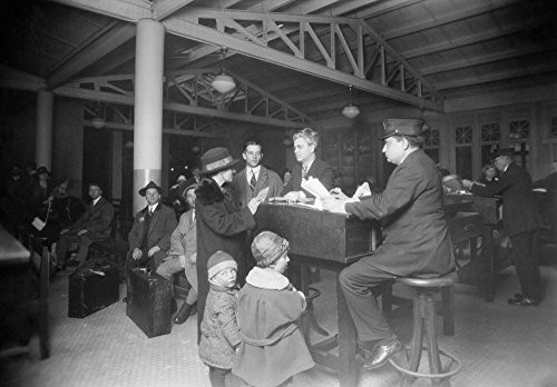 Immigrants Ellis Island Nimmigration Officials Examining An Immigrant Family PhotographNby Lewis Hine C1917 Poster Print by 18 x 24 Immigrants Ellis Island Nimmigration Officials Examining An Immigrant Family PhotographNby Lewis Hine C1917 Poster Print by 18 x 24