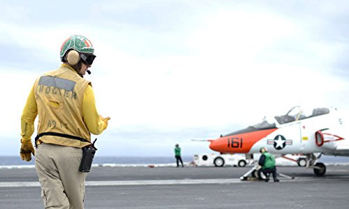 Posterazzi GLP469052LARGE Poster Print Collection Shooter Signals To The Pilot Of A T 45C Goshawk Training Aircraft Poster Print By Stock trek Images   17 X 11    Multicolored