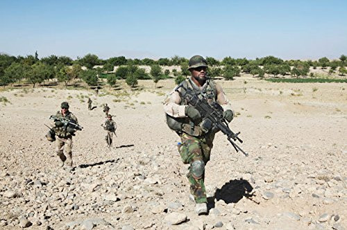 Dutch Army soldiers on foot patrol in Afghanistan Poster Print by VWPicsStocktrek Images  17 x 11