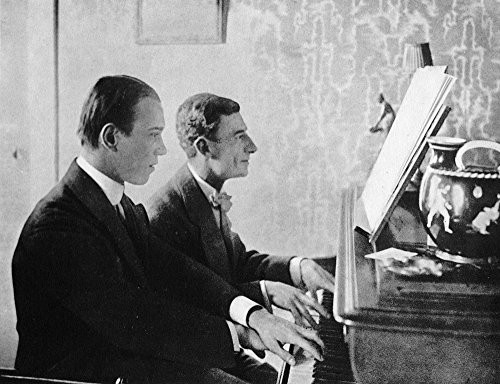 Ravel And Nijinsky 1912 Nmaurice Ravel (Right) With Nijinsky At The Piano On The Stand Of Which Is The Score Of Daphnis And Chloe 1912 Poster Print by (18 x 24)