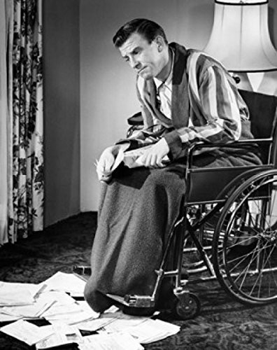 Posterazzi Mature man sitting in a wheelchair and thinking Poster Print  18 x 24