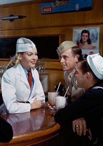 Posterazzi View of soldier standing at a bar counter talking to a young woman Poster Print (18 x 24)