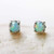 Sterling silver stud earrings with opal cabochon in prongs setting with sterling silver post and backing