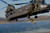 Posterazzi Poster Print Collection a US Navy Seal Fast-Ropes from a MH-47 Chinook Helicopter Stocktrek Images  -17 x 11-  Multicolored