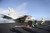 Posterazzi Pacific Ocean December 2 2013-An FA-18F Super Hornet launches from the aircraft carrier USS Nimitz CVN 68_ Poster Print 17 x 11