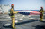 Posterazzi Firemen fold the American flag aboard USS William P_ Lawrence Poster Print 17 x 11