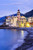 Posterazzi Buildings illuminated Poster Print by lights along the waters edge at sunrise Camogli Liguria Italy 12 x 19