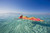 Posterazzi DPI1975974 French Polynesia Tahiti Moorea Woman Floating In Water_ Poster Print 19 x 12