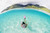 Posterazzi DPI1975982 French Polynesia Moorea Woman Free Diving In Turquoise Ocean_ Poster Print 19 x 12