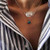 Gortin Double layer Necklace Silver Boho Turquoise Pendant Chain Feather Necklaces Jewelry for Women and Girls Gortin Double layer Necklace Silver Boho Turquoise Pendant Chain Feather Necklaces Jewelry for Women and Girls