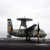 An E-2C Hawkeye launches from the flight deck of USS John C Stennis Poster Print by Stocktrek Images 17 x 11