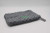 Norwex Graphite  gray  bathroom scrub mitt.